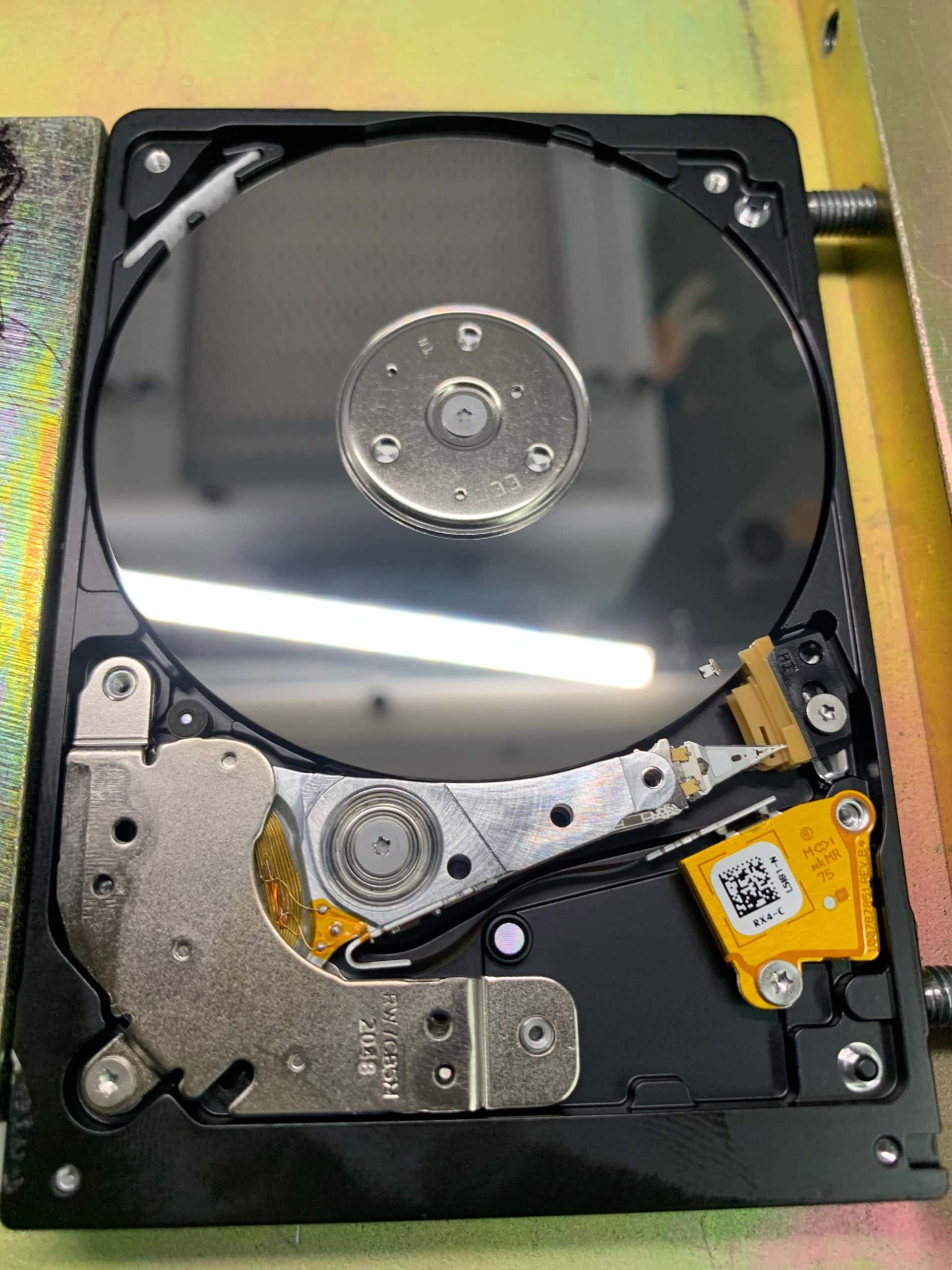 Head visibly stuck on platter on Seagate Hard Drive Beeping