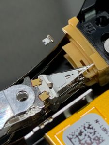 Seagate drive open with a head visibly stuck on the top platter